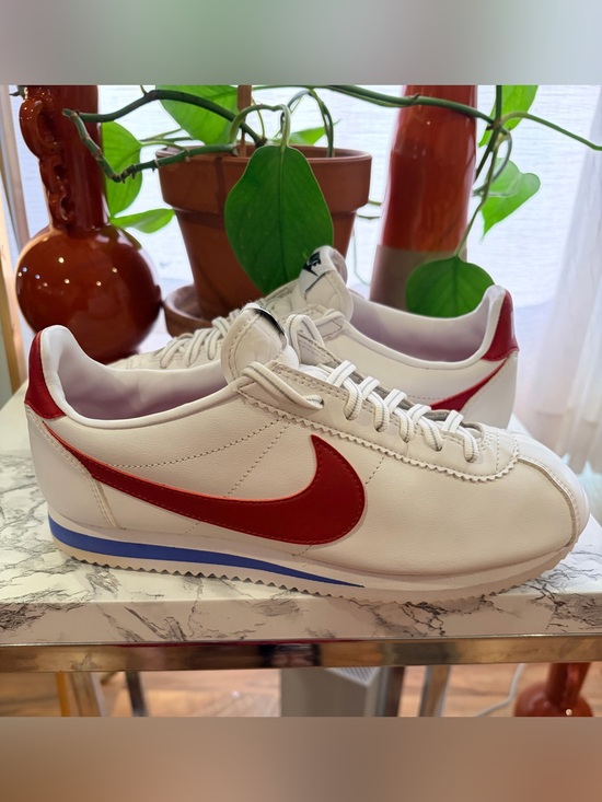 Nike Other - Nike Men’s White Leather Sneakers with Red Swoosh and Blue Midsole Accent